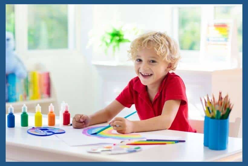 Image of Toddler painting and learning colors
