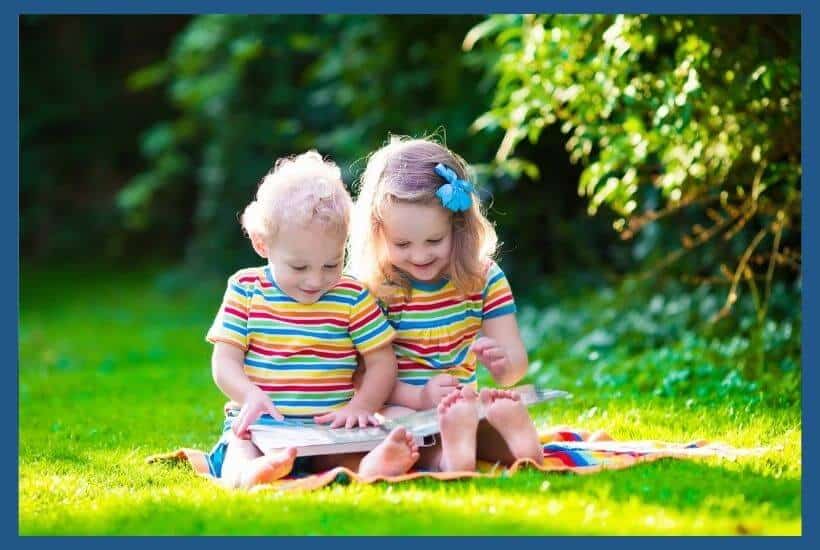 Toddlers Reading Outside