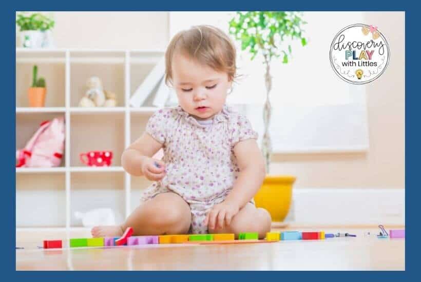 Toddler playing with educational toy