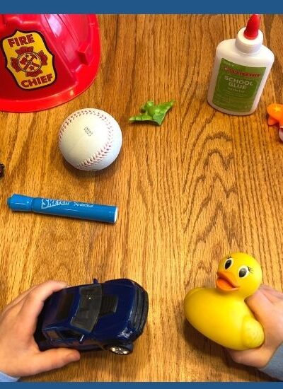 Image of child using toys to rhyme