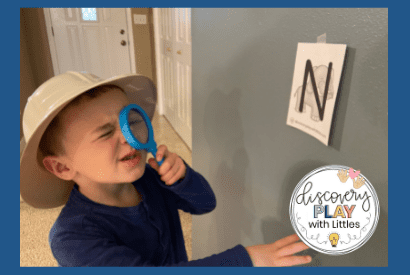 Image of a preschooler going on an alphabet hunt