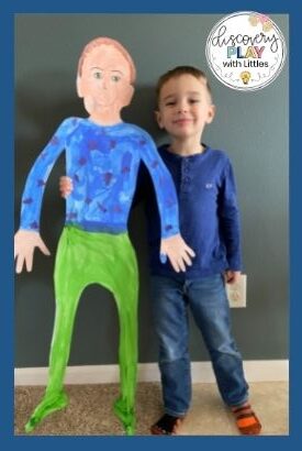 Image of Preschool boy with life size all about me poster