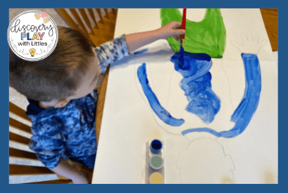 Image of preschool boy painting life size all about me poster