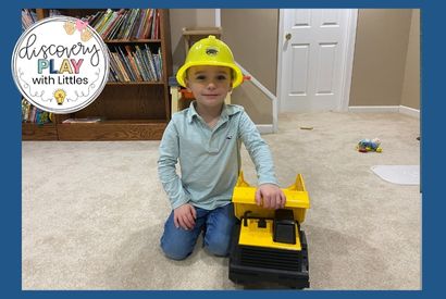 Preschooler playing construction worker