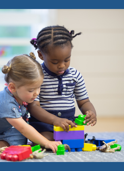 Toddlers playing blocks