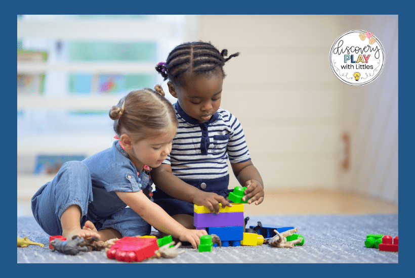 Toddlers playing blocks 